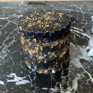 Black and gold jar with lid